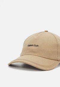 Calvin Klein LETTERING UNISEX - Cappellino - travertine
