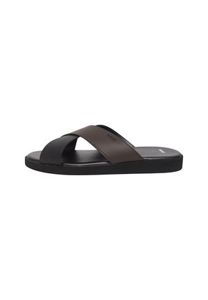 Brown and black slide sandal with crossed straps, flat sole, and logo on the insole. Made from synthetic materials, featuring smooth texture.