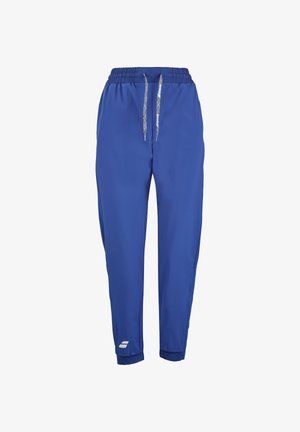 Pantaloni sportivi blu realizzati in tessuto leggero, caratterizzati da una vita elasticizzata con cordino, gambe affusolate e un logo accentuato alla caviglia.