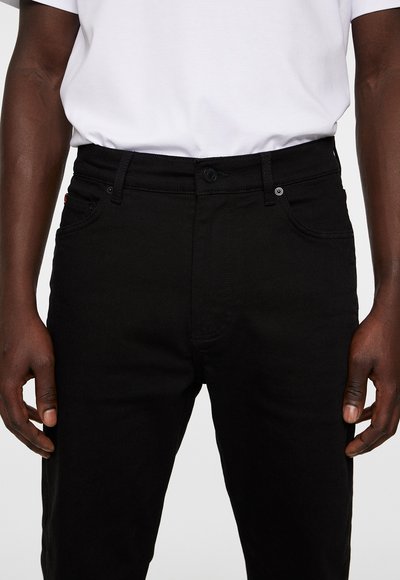 J.LINDEBERG Traperice ravnih nogavica - black
