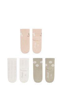 Set aus sechs Socken: zwei pastellrosa mit Vogelmotiv, zwei weiße mit strukturiertem Muster und zwei olivgrüne mit floralem Akzent.