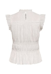 Blouse blanche texturée sans manches avec des manches courtes à volants, taille froncée, ourlet péplum et petite ouverture en forme de goutte d'eau au niveau de l'encolure arrière.