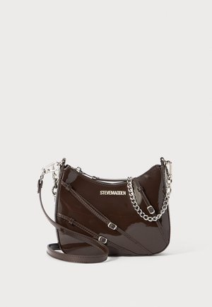 Brown patent leather handbag with a curved shape, silver chain accents, and a detachable strap featuring adjustable lengths. Logo displayed on front.