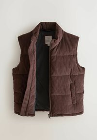 Braune Corduroy-Puffweste mit hohem Kragen, Seitentaschen und Reißverschluss. Gefüttert mit einem glatten schwarzen Stoff und mit quadratischer Steppung.