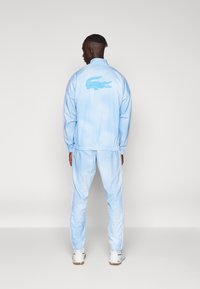 Lacoste Sport TRACKSUITS TRACK SET - Träningsset - light blue/white