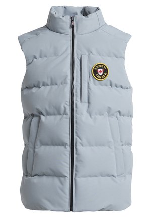 Light gray padded vest with high collar, front zipper, and side pockets. Features a round patch with "Zavetti Canada" in black and red.