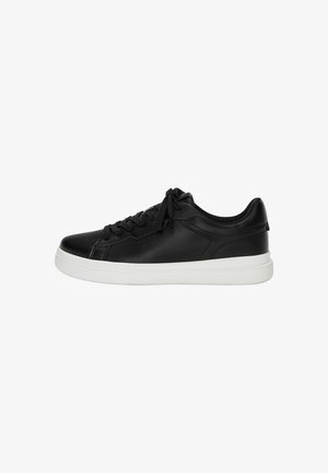 Black leather sneakers with a smooth finish, white rubber sole, round toe, and traditional lacing. Minimalist design with subtle stitching details.