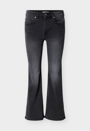 Μαύρα τζιν με καμπάνα από τζιν ύφασμα, με τέσσερις τσέπες, θηλιές για ζώνη και ξεθωριασμένη υφή με ελαφρώς πιο σκουρόχρωμη απόχρωση στο τελείωμα.