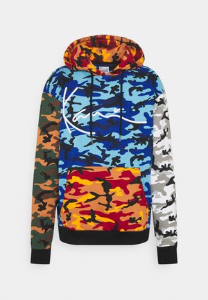 Hooded sweatshirt with a multicolored camouflage pattern, featuring blue, orange, green, and gray shades, black accents, and a front pocket.