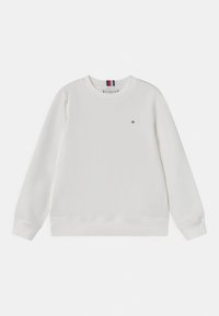Felpa bianca in cotone con maniche lunghe, polsini e orlo a costine, caratterizzata da un piccolo emblema sul petto. Design semplice e minimale.