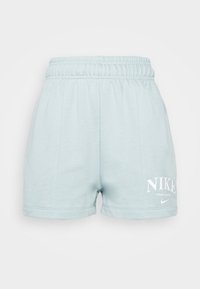 Light blue Nike athletic shorts with elastic waistband and white logo on the lower left leg.