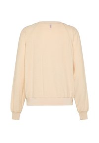 Vaaleanbeige collegepaita, jossa pitkät hihat, resorit hihansuissa ja teksturoitu kangas. Ominaisuuksiin kuuluu pyöreä pääntie ja kuvioton, yhtenäinen malli.