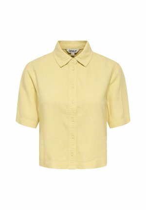 Camicia gialla a maniche corte con bottoni, colletto, vestibilità corta e etichetta "ONLY" all'interno del colletto.