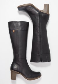 Black leather knee-high boots with a high, block heel. Features a side zipper and stitched accents near the upper. Smooth texture throughout.
