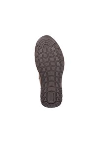 Brauner Gummisohle mit strukturierter Oberfläche. Verfügt über ein multidirektionales Profil für Grip und Haltbarkeit.