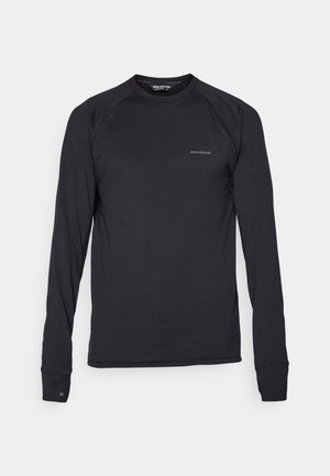 Black long-sleeve Salomon sports shirt with crew neck and subtle logo on chest and left wrist cuff, displayed against white background.