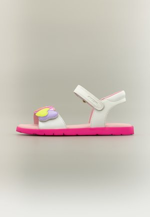 Sandale enfant blanche et rose avec bride en Velcro, décorée de formes de cœurs jaunes et violets sur la bride avant.
