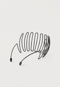 Black metal hairband with spaced curved loops and two rounded ends, isolated on a light background.