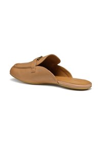 Tan leather slip-on shoes with a smooth finish, rounded toe, and stitched detailing. Features a subtle gold accent and open back design.