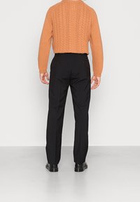 Weekday Kalhoty - black