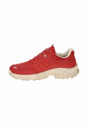 Red athletic shoe with white sole, lace-up front, padded collar, and textured outsole for traction, shown from the side on a white background.