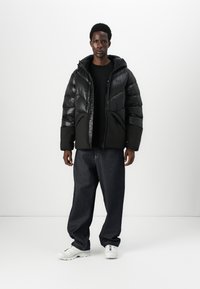 Helly Hansen VILLAGE UNISEX - Daunenjacke - black