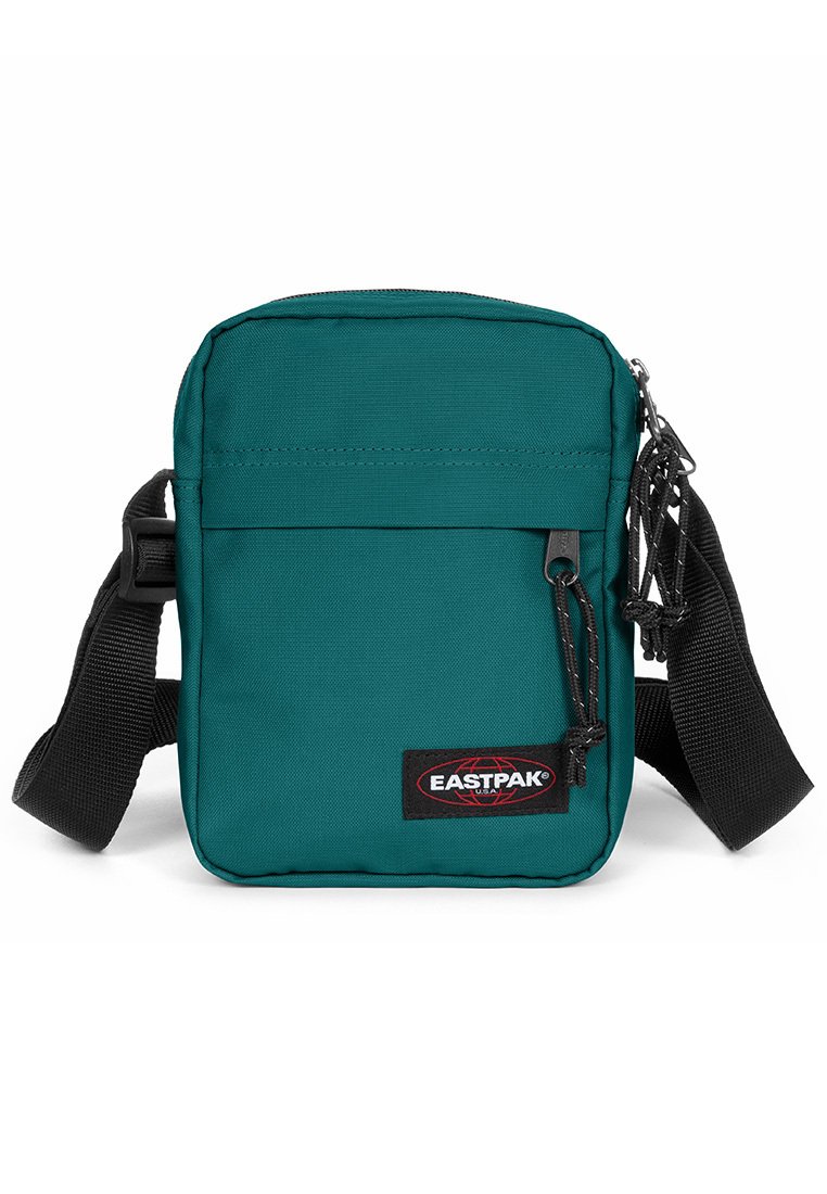 Teal nylon axelväska med justerbar svart axelrem, framficka med dragkedja och Eastpak-logotyp. Slät yta, rektangulär form.