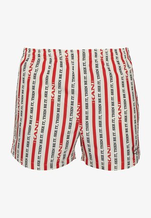 Punaiset ja valkoiset raidalliset uimashortsit, joissa on tekstikuvio. Elastinen vyötärö ja rento istuvuus. Valmistettu kevyestä, hengittävästä kankaasta.