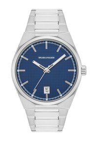 Reloj de acero inoxidable plateado con un dial azul texturizado, marcadores de hora plateados y una pantalla de fecha a las 6 en punto. Cuenta con una pulsera de metal.