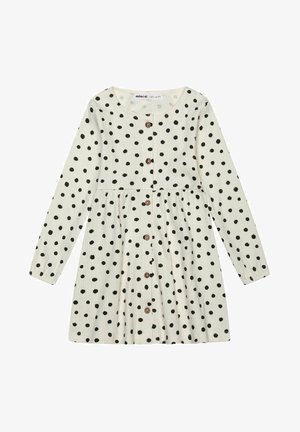 Hosszú ujjú ruha krémszínű anyagból fekete pöttyökkel, kerek nyakkivágással és fa gombos záródással elöl.
