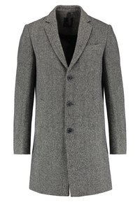 Cappotto grigio in tweed con vestibilità sartoriale, colletto a rifinitura, chiusura a tre bottoni e dettagli nelle tasche, con un'interno liscio.