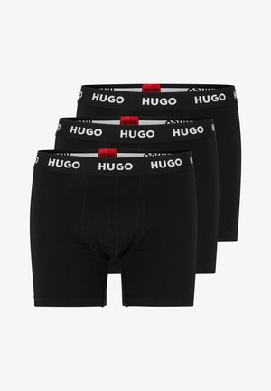 Sort strækbomulds boxer briefs, tre-pack. Med hvid "HUGO" logo på det elastiske taljebånd, glat tekstur og tætsiddende design.