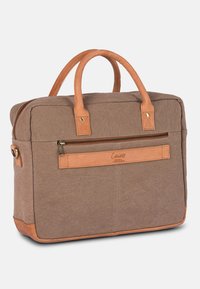 Brown canvas bag with tan leather accents, two top handles, zippered pockets, and a structured design for versatile use.