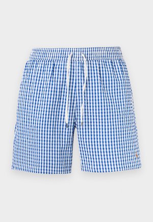 Costumi da bagno a quadretti blu e bianchi con vita elastica e coulisse bianca su sfondo neutro.