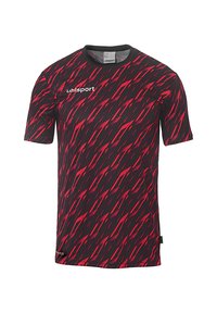 T-shirt de sport à manches courtes en noir et rouge, avec un motif ondulé diagonal, un col rond et le logo uhlsport imprimé à l'avant.