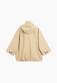 Veste à capuche beige avec manches longues larges, poignets boutonnés et ourlet à cordon ajustable, vue de dos sur fond blanc.