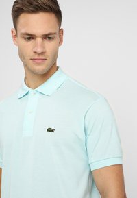 Lacoste Polotričko - aquarium