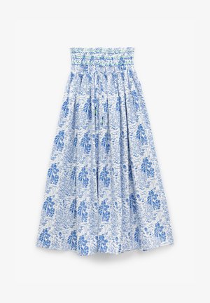 Gonna bianca con stampa floreale e paesaggistica blu, caratterizzata da una vita arricciata e un design fluido e plissettato. Materiale di cotone.