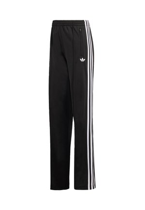 Czarne spodnie dresowe Adidas z elastycznym pasem, białe trzy paski po bokach, kieszeń na zamek oraz biały logo Trefoil na udzie.