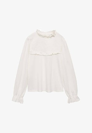 Biała bluzka z długim rękawem z marszczonym górnym przodem, falbanianym wysokim kołnierzykiem i falbanianymi mankietami na rękawach.