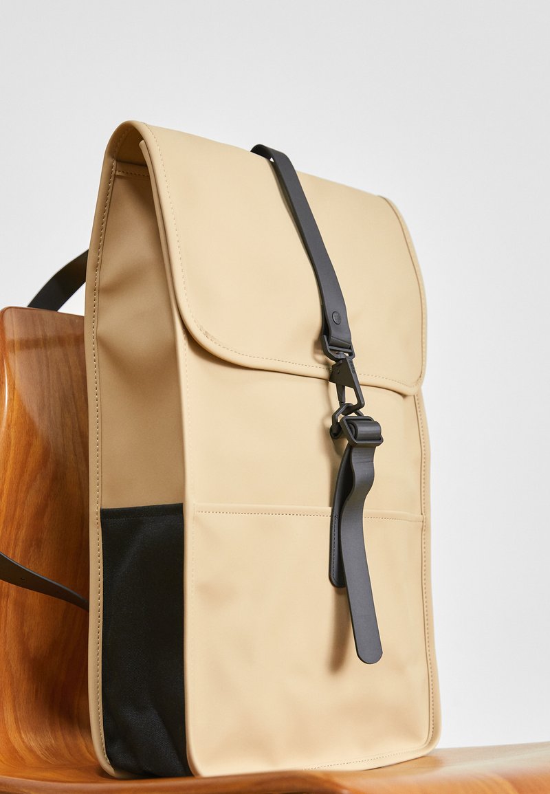 rains backpack beige Rolltop Rucksack Backpack Mini is a downscaled version of Backpack Rains Backpack Sand - TALI