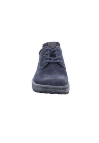 Navy blue lace-up shoes with a smooth leather upper, gray rubber sole, reinforced toe, and contrasting stitching details.