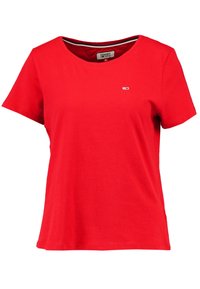 Röd kortärmad T-shirt i bomull med rund halsringning och en liten logotyp på vänster bröst. Slät yta och avslappnad passform.