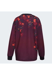 Maglione a maniche lunghe color cremisi con motivi floreali rossi scuri e luminosi concentrati intorno alle spalle e sulla parte superiore della schiena.