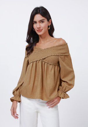 Brown off-the-shoulder blouse with smocked details, long puff sleeves, and ruffled cuffs. Lightweight fabric with a subtly textured finish.