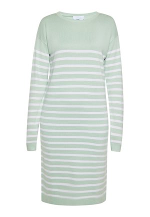 Sweter-dres w paski w jasnym zielonym i białym kolorze. Posiada długie rękawy, okrągły dekolt oraz luźny krój. Wykonany z miękkiej, teksturowanej tkaniny.