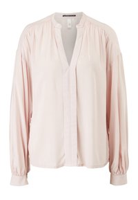 Blouse rose clair en tissu lisse avec un col en V, épaules froncées et manches longues bouffantes. Dotée d'une patte de boutonnage à l'avant et de poignets élastiques.