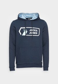 Felpa navy blue con tasca a marsupio frontale, cappuccio regolabile con cordino e stampa del logo bianca in evidenza. Tessuto morbido con polsini a coste.