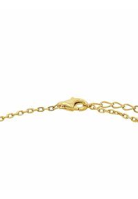 Guldkedja med ett kräfta-lås och justerbara länkar på en vit bakgrund.