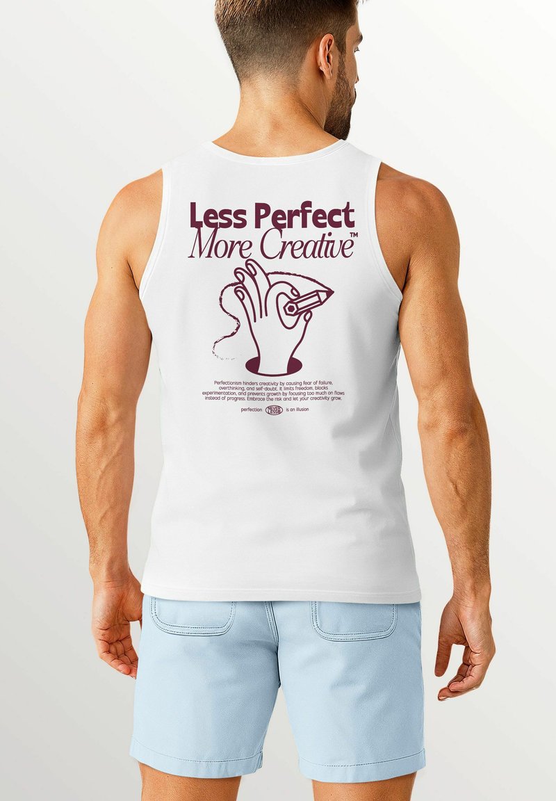 White tank top featuring maroon text: "Less Perfect More Creative." Graphic of a hand holding a pen, with sewing thread design below.